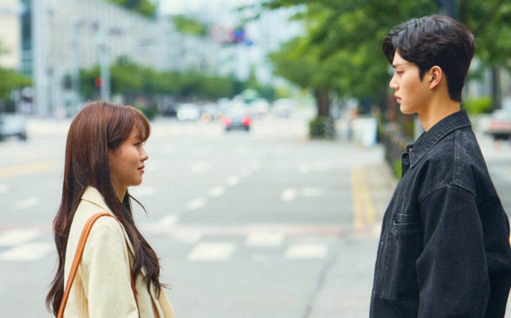 Couple meeting on street.