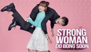 Strong woman lifting man