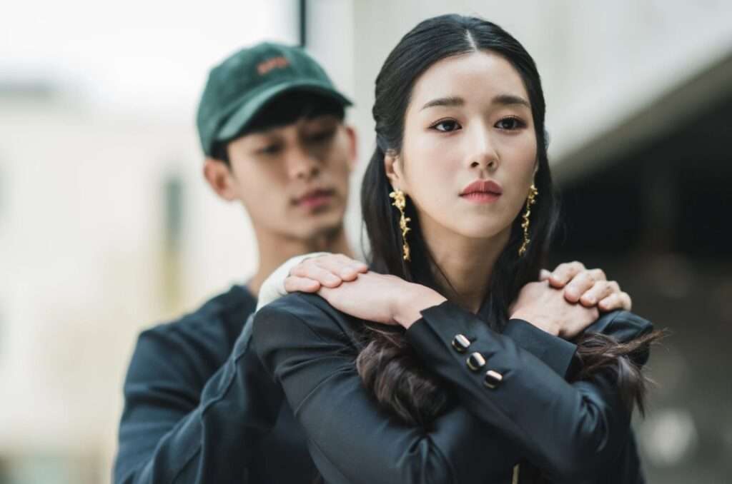 Man comforting woman from behind