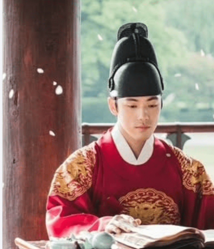 A king in ornate attire shares a discreet moment with a mysterious figure, representing a hidden romance