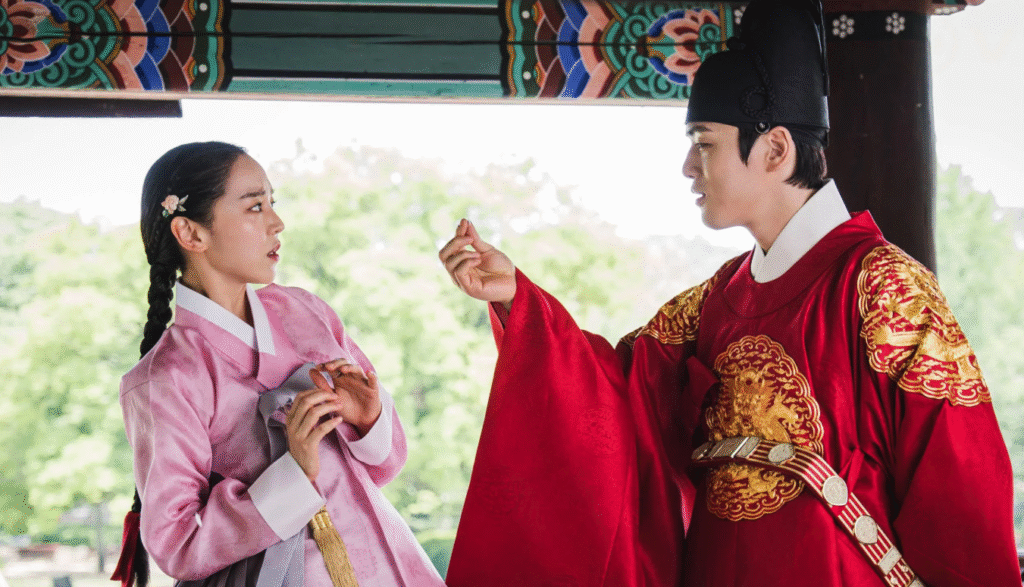 Historical couple in dramatic confrontation.