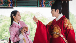 Historical couple in dramatic confrontation.
