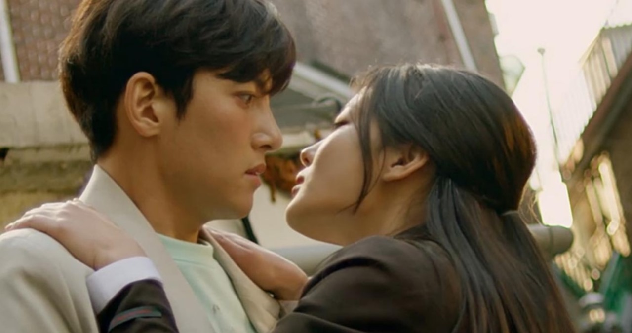 "Ji Chang-Wook and Kim You-Jung in an intense romantic scene from 'Backstreet Rookie,' sharing a close, emotional moment. Their characters, Choi Dae-Hyun and Jung Saet-Byul, are locked in a passionate gaze in a dramatic outdoor setting, highlighting their chemistry in the K-drama.