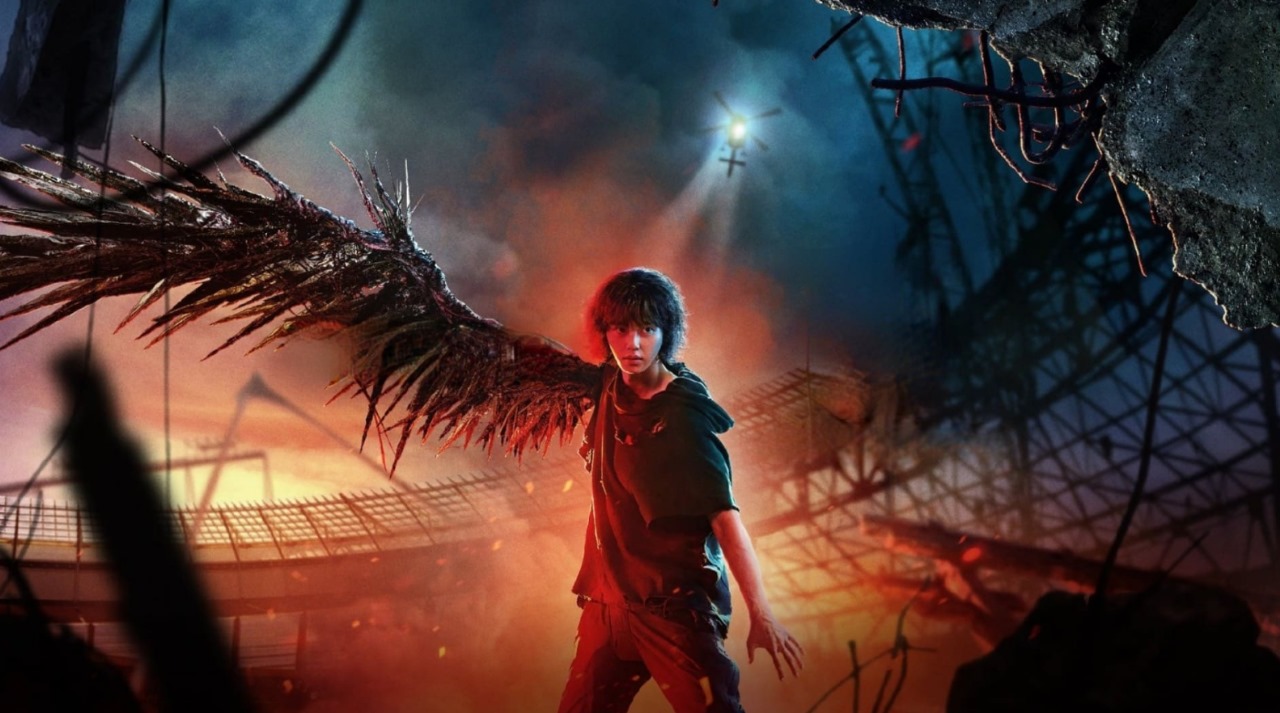 Young boy with dark, ethereal wings standing in a fiery, post-apocalyptic landscape, with a helicopter in the background and destruction all around, creating a dramatic and intense atmosphere.