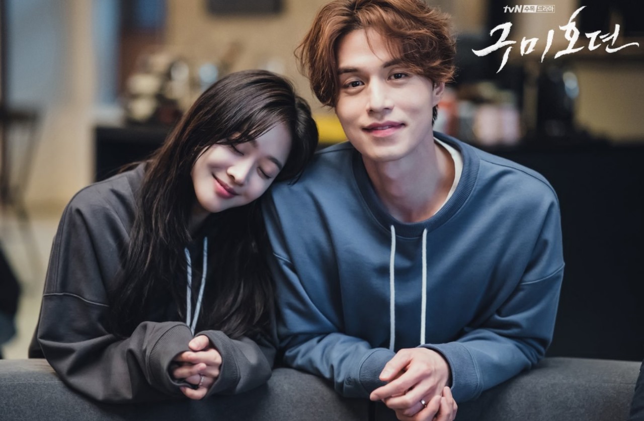 Sweet and cozy moment from 'Tale of the Nine-Tailed,' featuring Jo Bo-ah and Lee Dong-wook sharing a warm, intimate moment while wearing matching sweatshirts.