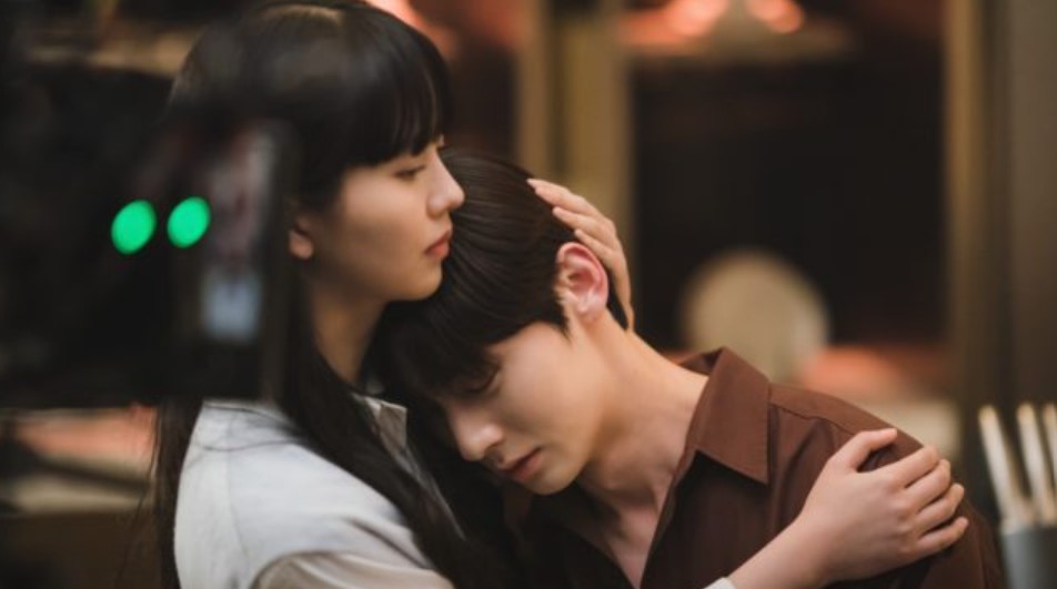 Scene from 'My Lovely Liar' showing a tender moment between the main characters as the female character comforts the male character in a close embrace, capturing an emotional and intimate connection.
