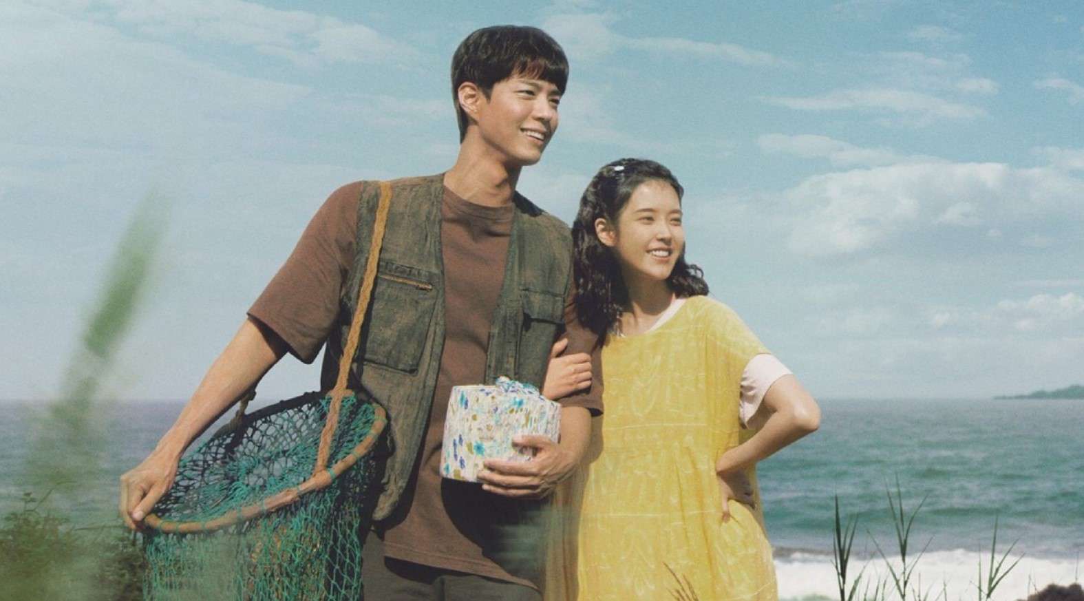 Scene from the 2025 K-Drama "When Life Gives You Tangerines," featuring a moment associated with one of the Top 2025 KDrama Songs, “Midnight Walk” by IU.
