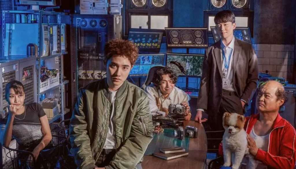 Scene from Bad Prosecutor full review featuring Doh Kyung-soo as Jin Jung in a green jacket, surrounded by the cast in a high-tech office, with a dog and cameras, highlighting the K-drama's investigative vibe on KBS2.