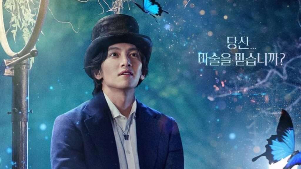 A magical scene from "The Sound of Magic" featuring a man in a top hat and blue suit, surrounded by glowing butterflies and a mystical forest background.