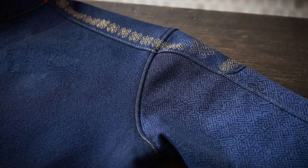 Geometric pattern and stitching detail on a modern KBO-style jersey