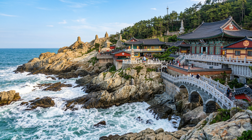  Haedong Yonggungsa Temple perched on rocky ocean cliffs in Busan South Korea with waves crashing below