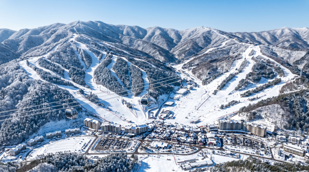 Aerial view of a snow-covered ski resort in Korea's Gangwon Province mountains in winter